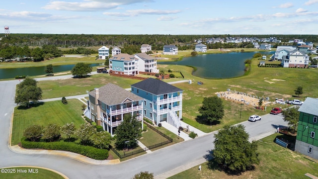 bird's eye view with a water view