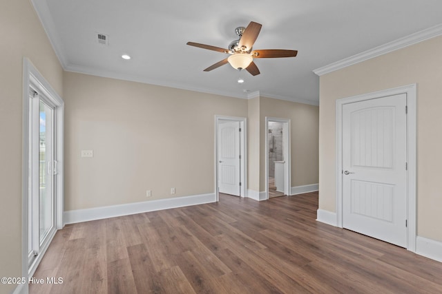 unfurnished room with ceiling fan, hardwood / wood-style flooring, and crown molding