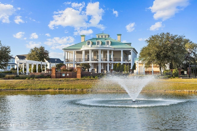 view of property with a water view