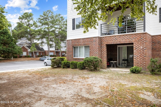 exterior space featuring a balcony