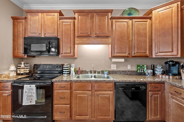 kitchen with sink, stone countertops, ornamental molding, and black appliances