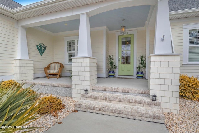 property entrance with covered porch