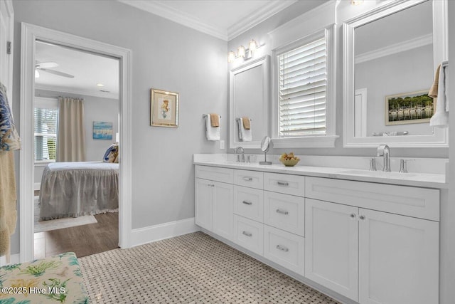 bathroom featuring vanity and ornamental molding