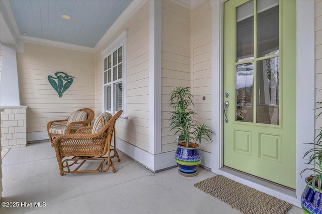 property entrance featuring covered porch