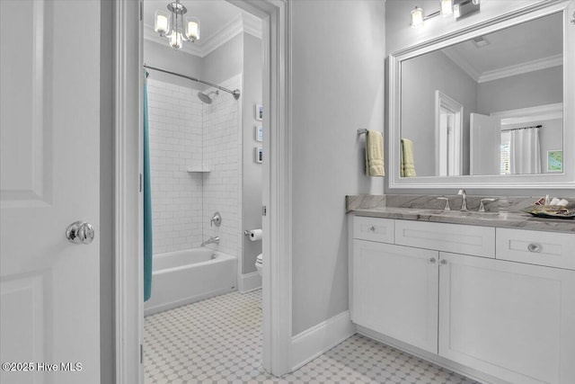 full bathroom featuring vanity, crown molding, a notable chandelier, toilet, and tiled shower / bath