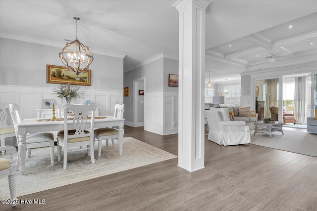 dining room with ornate columns, coffered ceiling, crown molding, a notable chandelier, and beamed ceiling