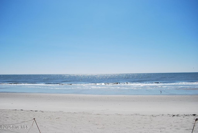 view of water feature featuring a beach view