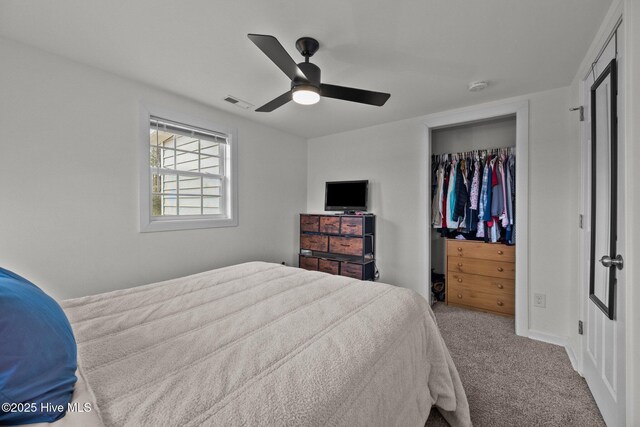 bedroom with ceiling fan and light colored carpet