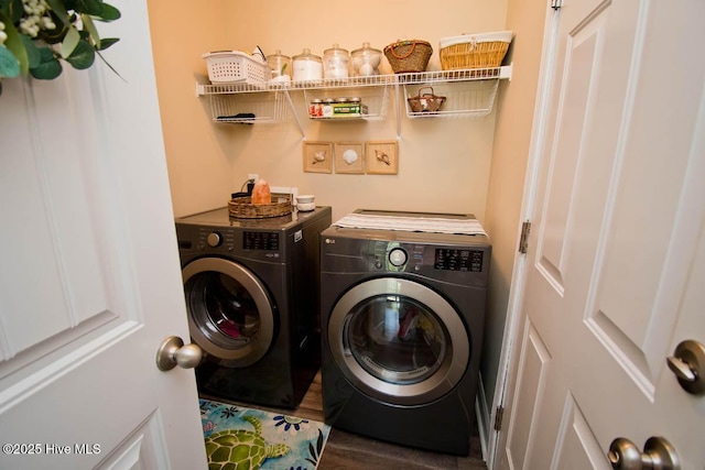 laundry room with independent washer and dryer