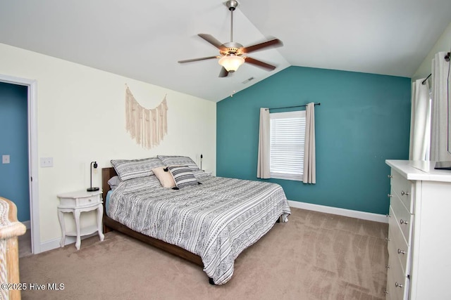 bedroom with ceiling fan, light carpet, and lofted ceiling