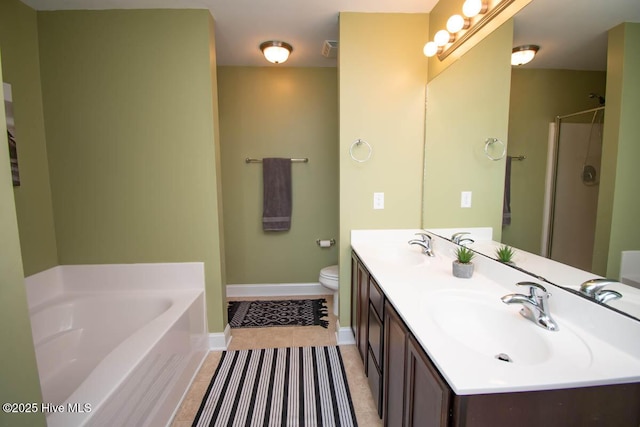 full bathroom featuring separate shower and tub, tile patterned flooring, vanity, and toilet