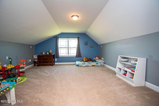 rec room featuring lofted ceiling and carpet floors