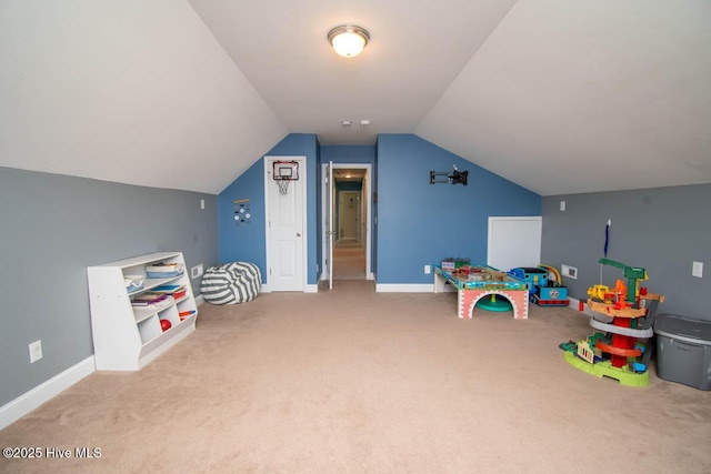 rec room featuring lofted ceiling and carpet floors