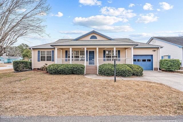 single story home with covered porch, a front yard, and a garage