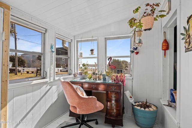 sunroom featuring lofted ceiling