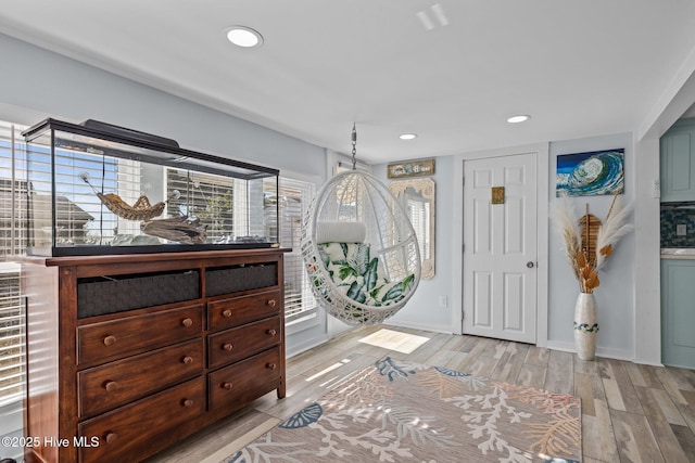 entrance foyer with light hardwood / wood-style flooring