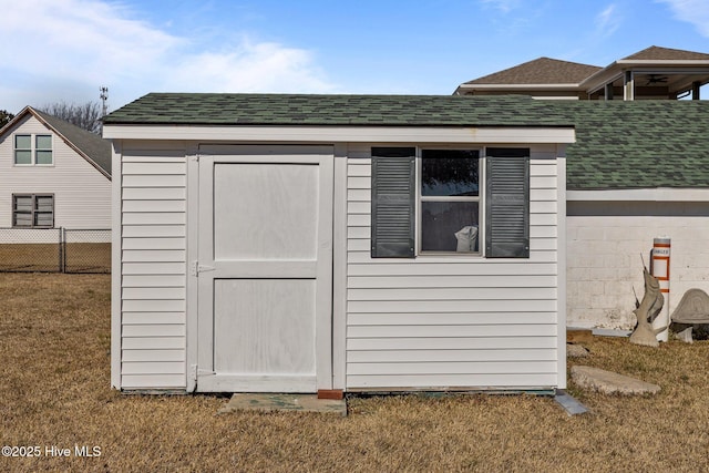 view of outdoor structure featuring a yard