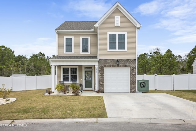 front facade featuring a porch, a front yard, and a garage