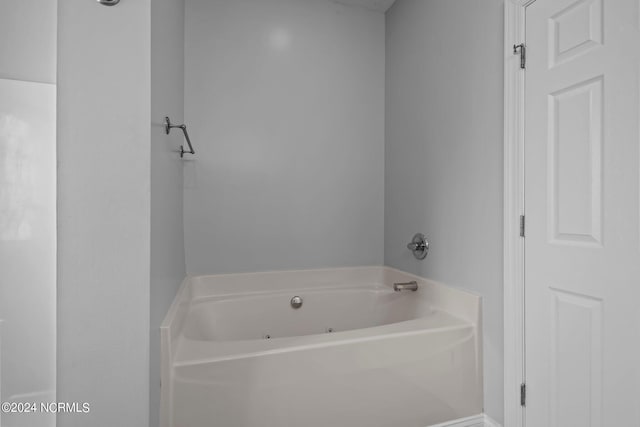 bathroom with a tub