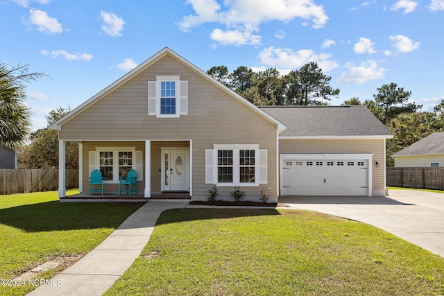 view of front of house with a front yard, a porch, and a garage