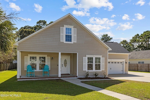 view of front of home featuring a porch, a garage, and a front lawn