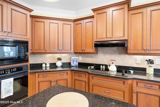 kitchen with backsplash, black appliances, brown cabinets, and under cabinet range hood