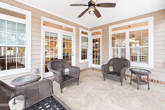 view of patio with ceiling fan