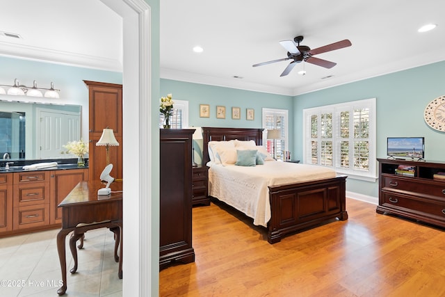 bedroom with crown molding, ceiling fan, and light wood-type flooring