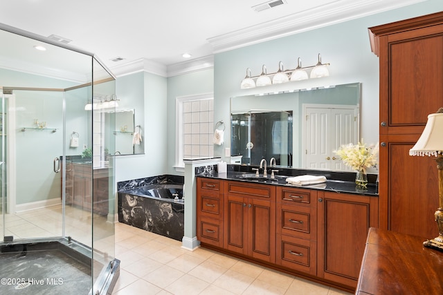 bathroom with tile patterned flooring, vanity, crown molding, and independent shower and bath