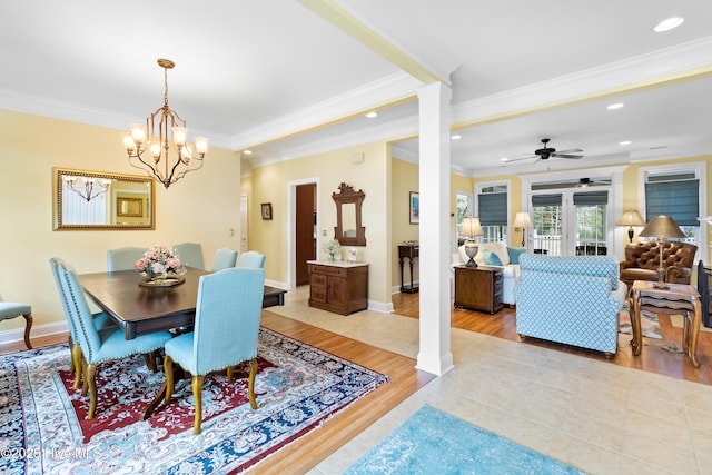 dining space featuring crown molding, baseboards, ceiling fan with notable chandelier, recessed lighting, and light wood-style flooring