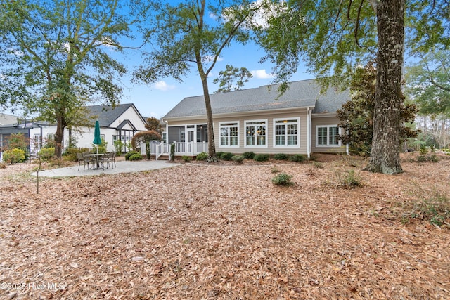 rear view of house with a patio area