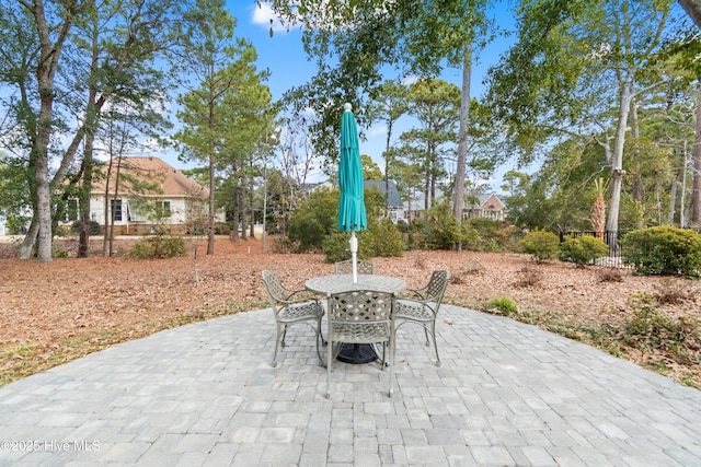 view of patio / terrace with fence and outdoor dining space