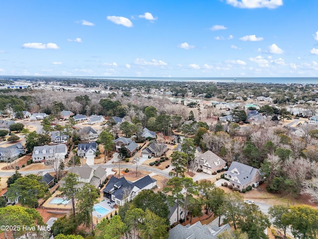 birds eye view of property with a residential view