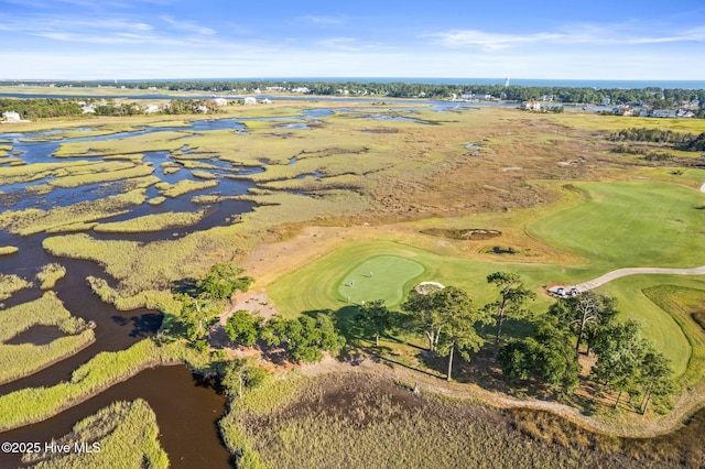 aerial view with a water view and view of golf course