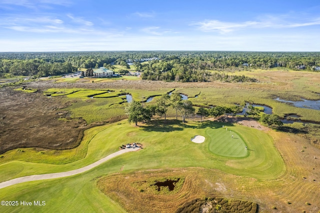 birds eye view of property with golf course view