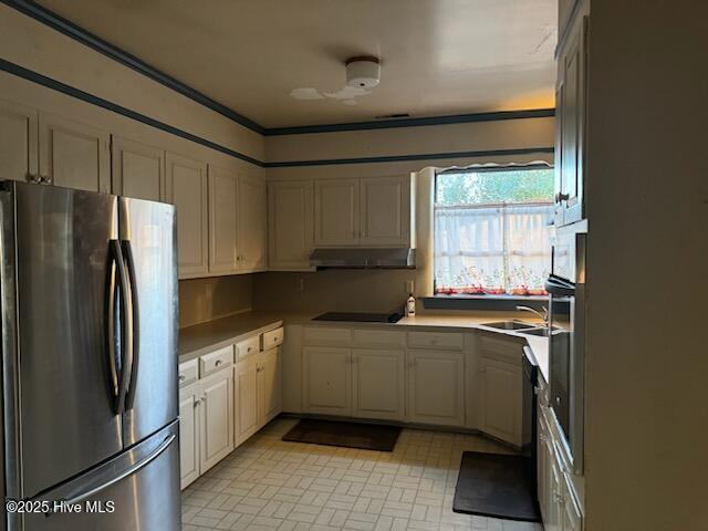 kitchen with sink and black appliances