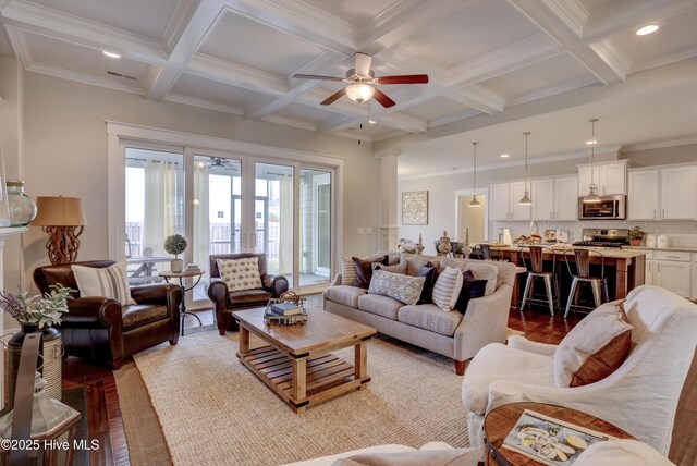 living room with beam ceiling, ceiling fan, light hardwood / wood-style flooring, and coffered ceiling