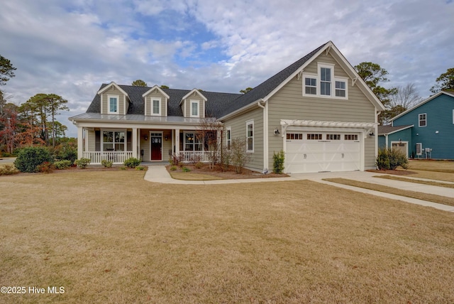 cape cod house featuring a garage, covered porch, and a front lawn