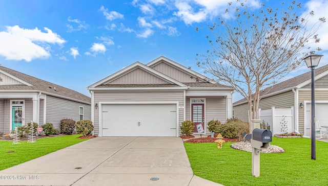 view of front facade featuring a front lawn and a garage