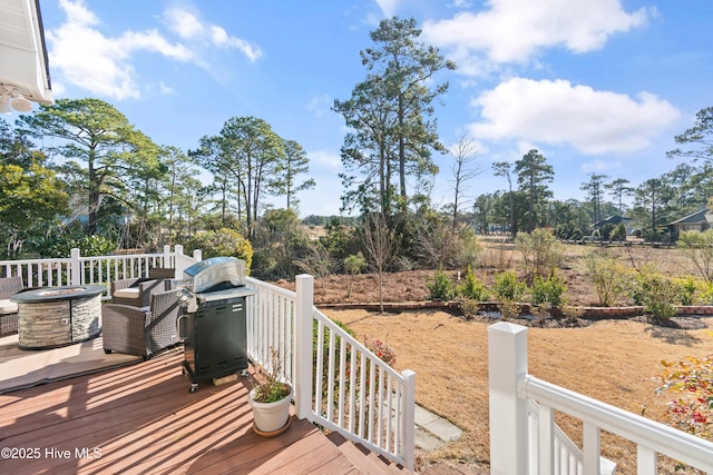 wooden deck with area for grilling