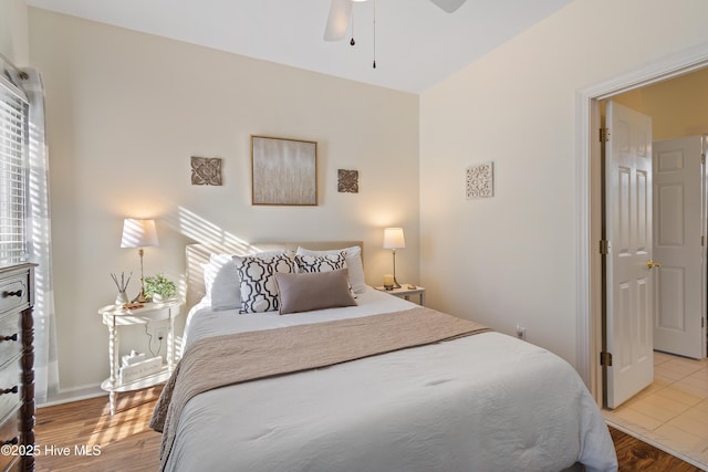 bedroom featuring ceiling fan and wood-type flooring