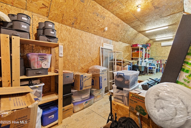 storage room featuring a wall mounted AC