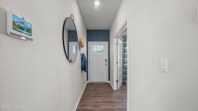 interior space with dark hardwood / wood-style flooring