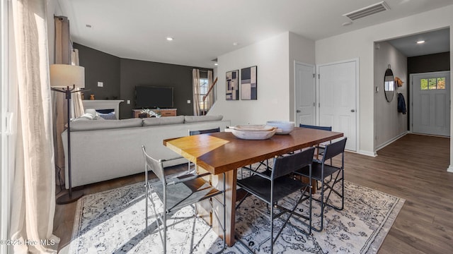 dining area featuring hardwood / wood-style floors