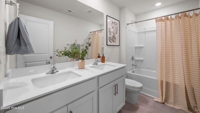 full bathroom with vanity, toilet, and shower / bath combo with shower curtain