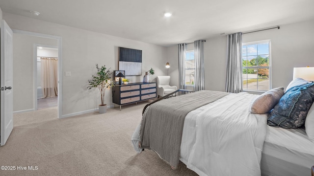 bedroom featuring light carpet