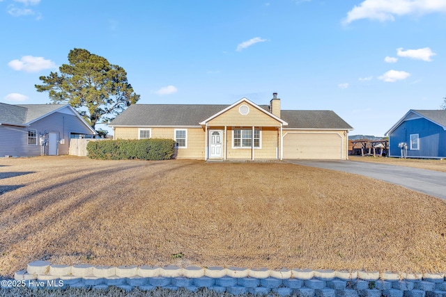 single story home featuring a garage