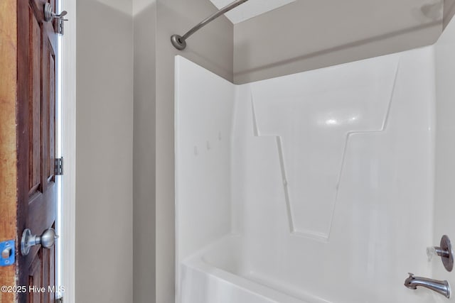 bathroom with shower / bathing tub combination