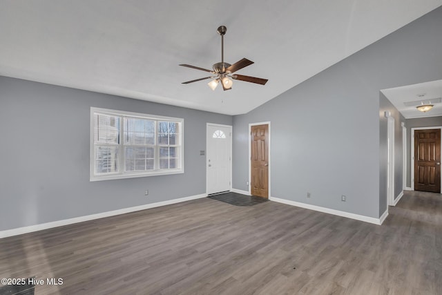 interior space featuring ceiling fan, hardwood / wood-style floors, and vaulted ceiling