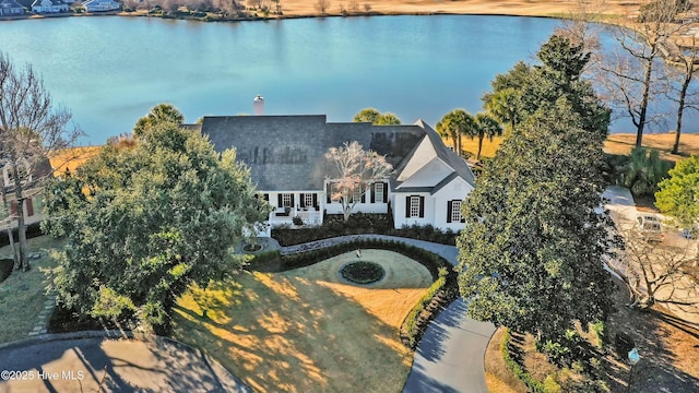 birds eye view of property featuring a water view